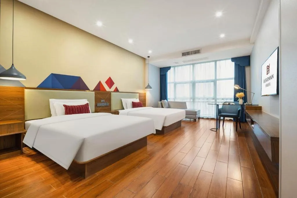 Bed in Borrman Hotel Fangchenggang High-speed Railway North Station Crystal International