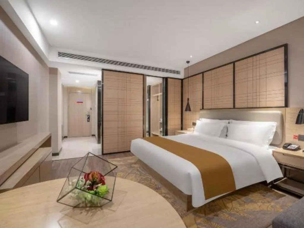 Bed in Echarm Hotel Zibo Gaoqing Zhongcheng Inernational