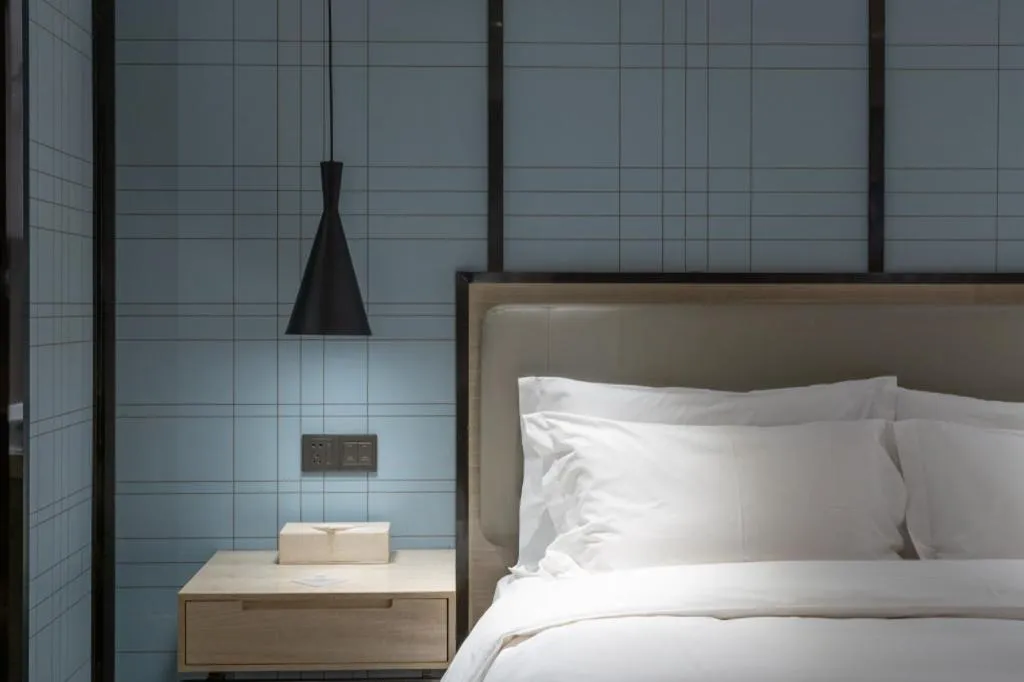 Bed in Echarm Hotel Zibo Gaoqing Zhongcheng Inernational