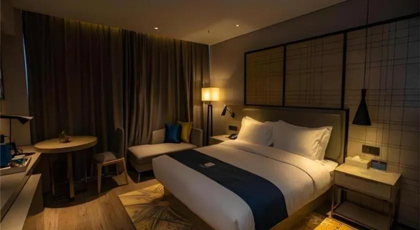 Bed in Echarm Hotel Zibo Gaoqing Zhongcheng Inernational