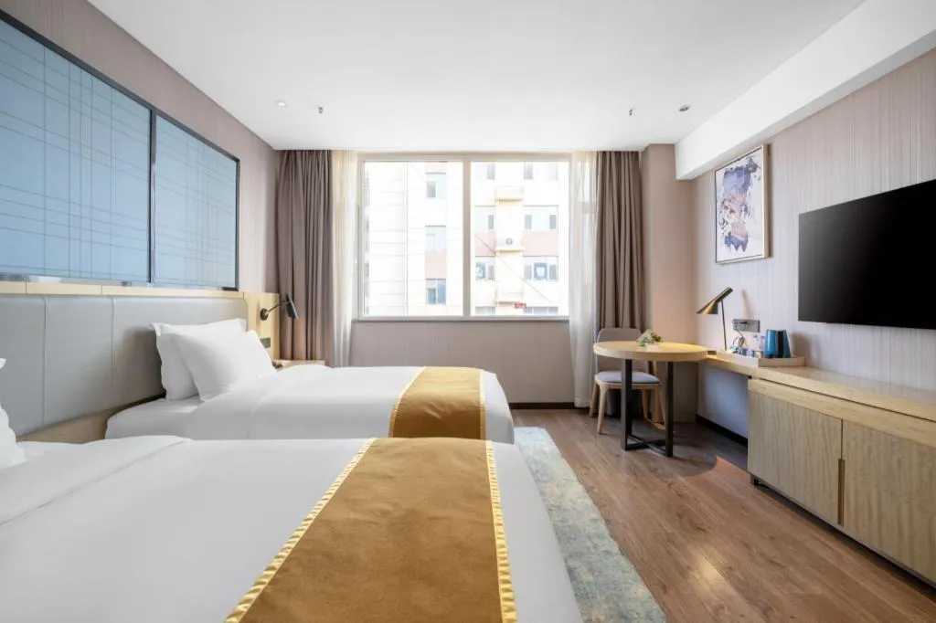 Bed in Echarm Hotel Zibo Gaoqing Zhongcheng Inernational