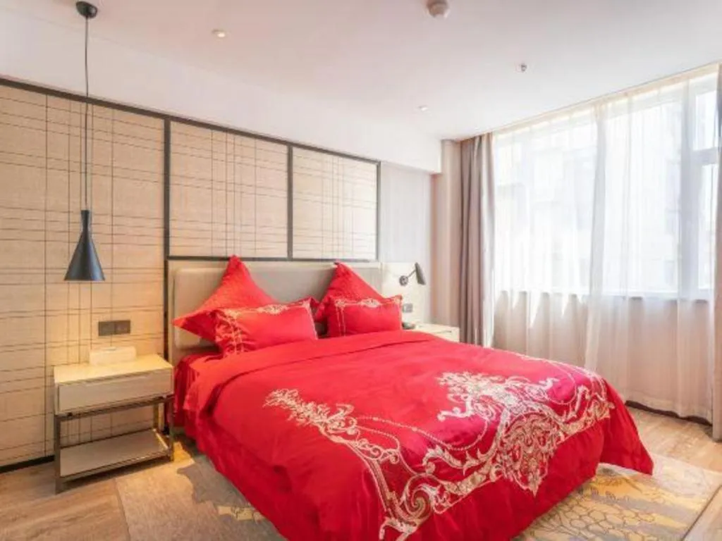 Bed in Echarm Hotel Zibo Gaoqing Zhongcheng Inernational