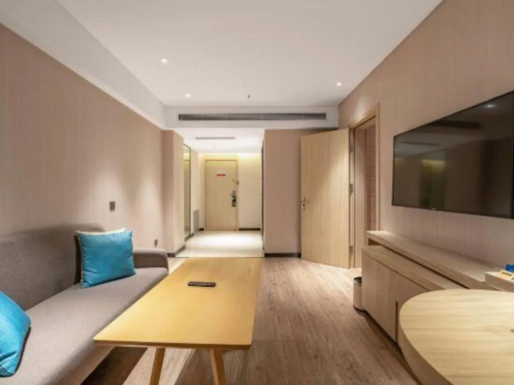 Bed in Echarm Hotel Zibo Gaoqing Zhongcheng Inernational