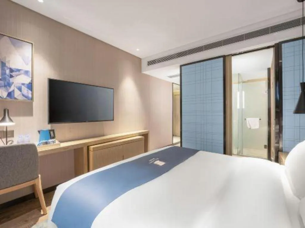 Bed in Echarm Hotel Zibo Gaoqing Zhongcheng Inernational