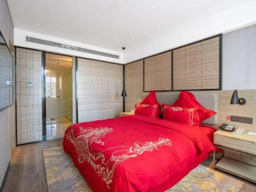 Bed in Echarm Hotel Zibo Gaoqing Zhongcheng Inernational