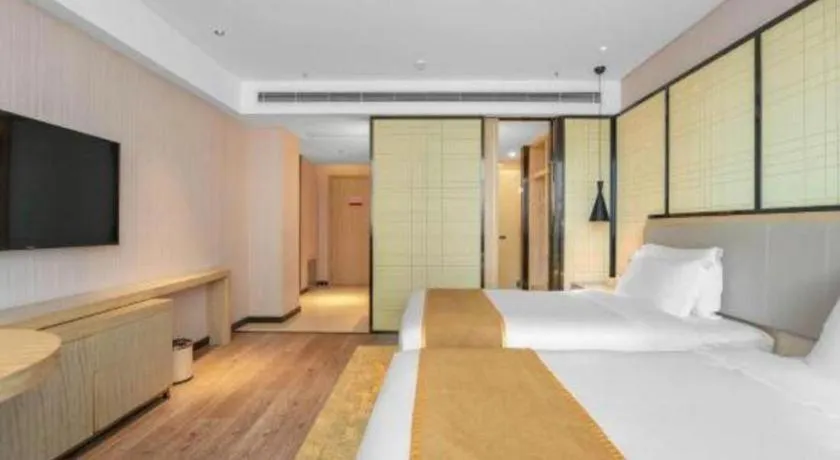 Bed in Echarm Hotel Zibo Gaoqing Zhongcheng Inernational