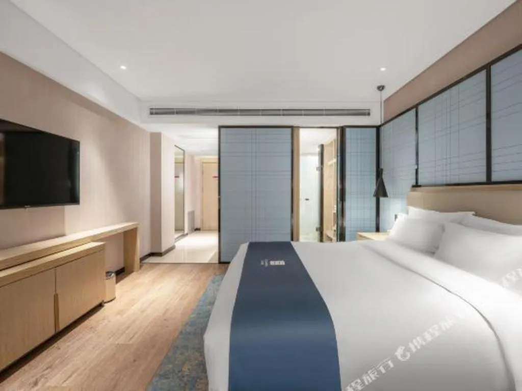 Bed in Echarm Hotel Zibo Gaoqing Zhongcheng Inernational