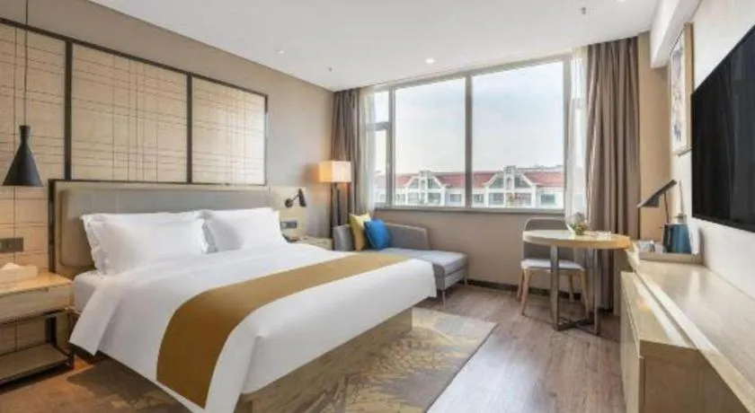 Bed in Echarm Hotel Zibo Gaoqing Zhongcheng Inernational