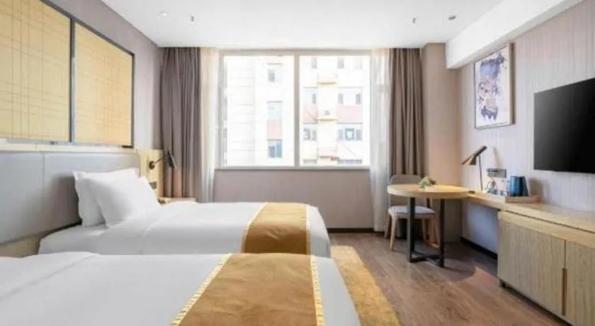 Bed in Echarm Hotel Zibo Gaoqing Zhongcheng Inernational