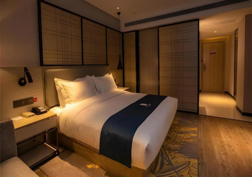 Bed in Echarm Hotel Zibo Gaoqing Zhongcheng Inernational