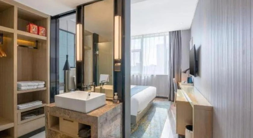 Bed in Echarm Hotel Zibo Gaoqing Zhongcheng Inernational