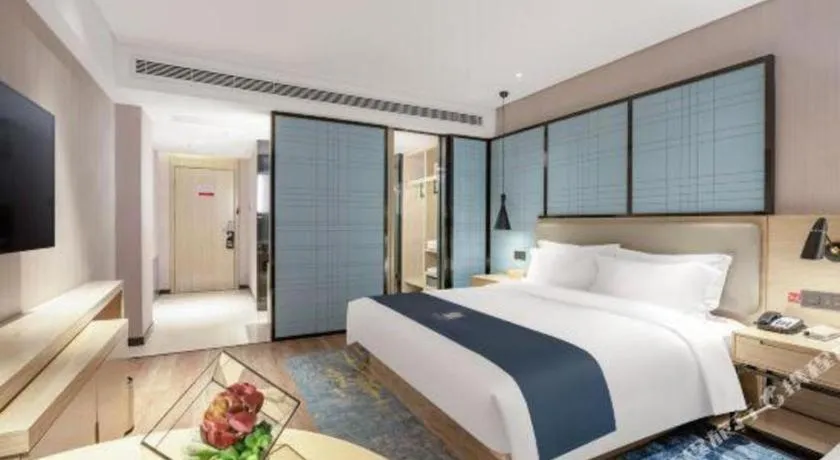 Bed in Echarm Hotel Zibo Gaoqing Zhongcheng Inernational