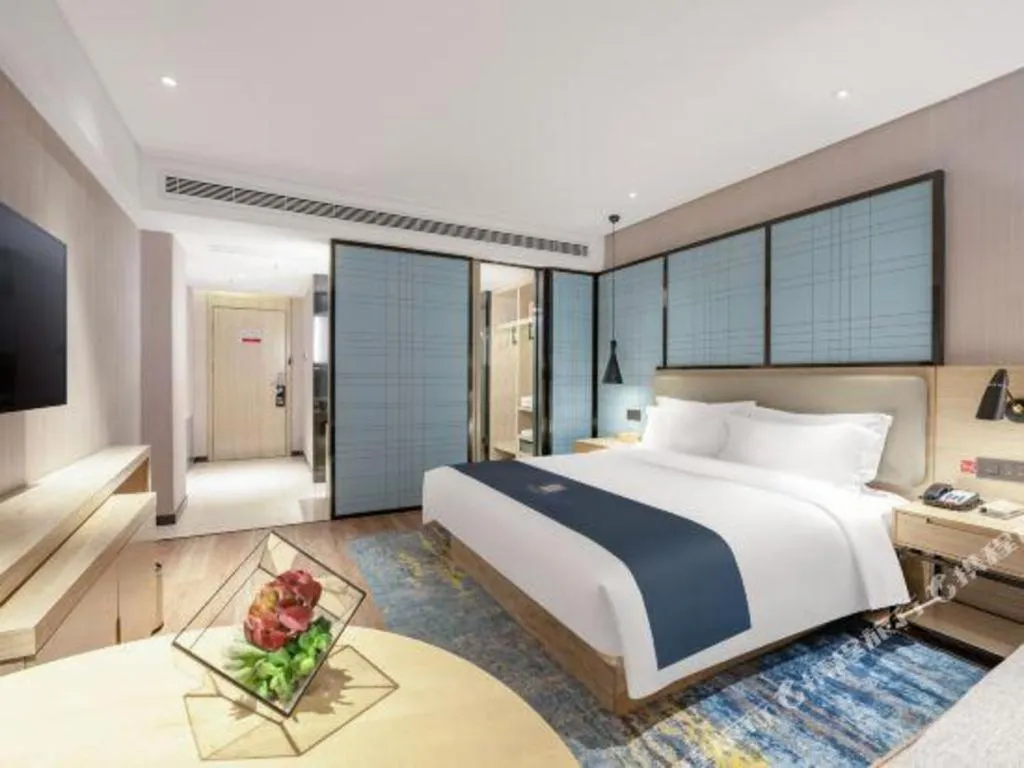 Bed in Echarm Hotel Zibo Gaoqing Zhongcheng Inernational