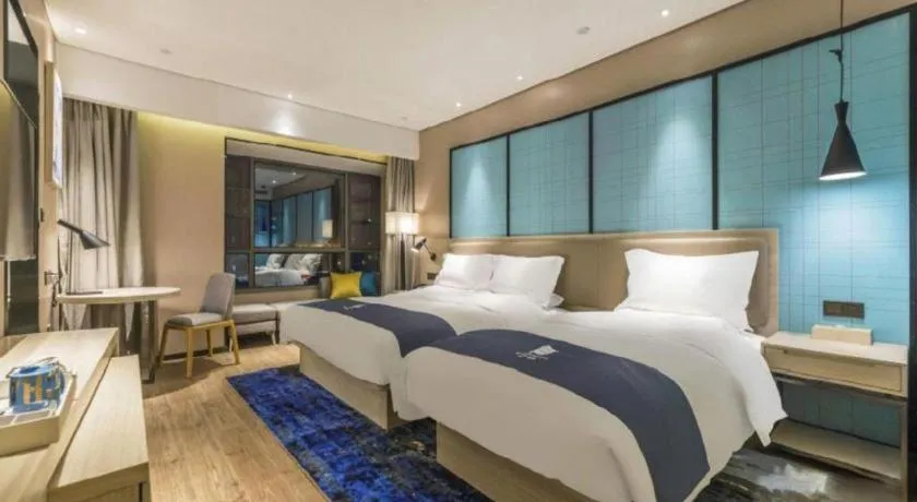 Bed in Echarm Hotel Kunming Railway Station Huancheng South Road Metro Station