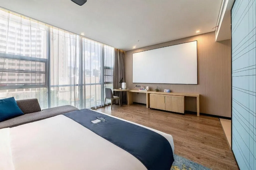 Bed in Echarm Hotel Kunming Railway Station Huancheng South Road Metro Station