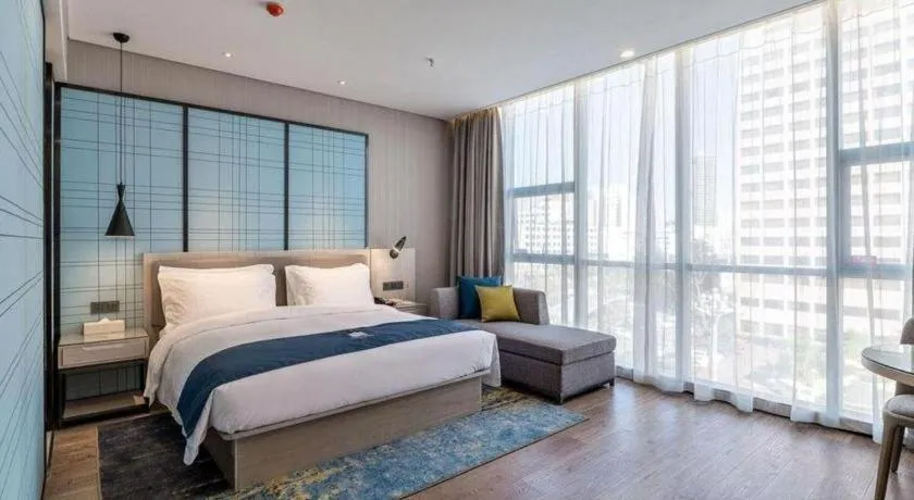 Bed in Echarm Hotel Kunming Railway Station Huancheng South Road Metro Station