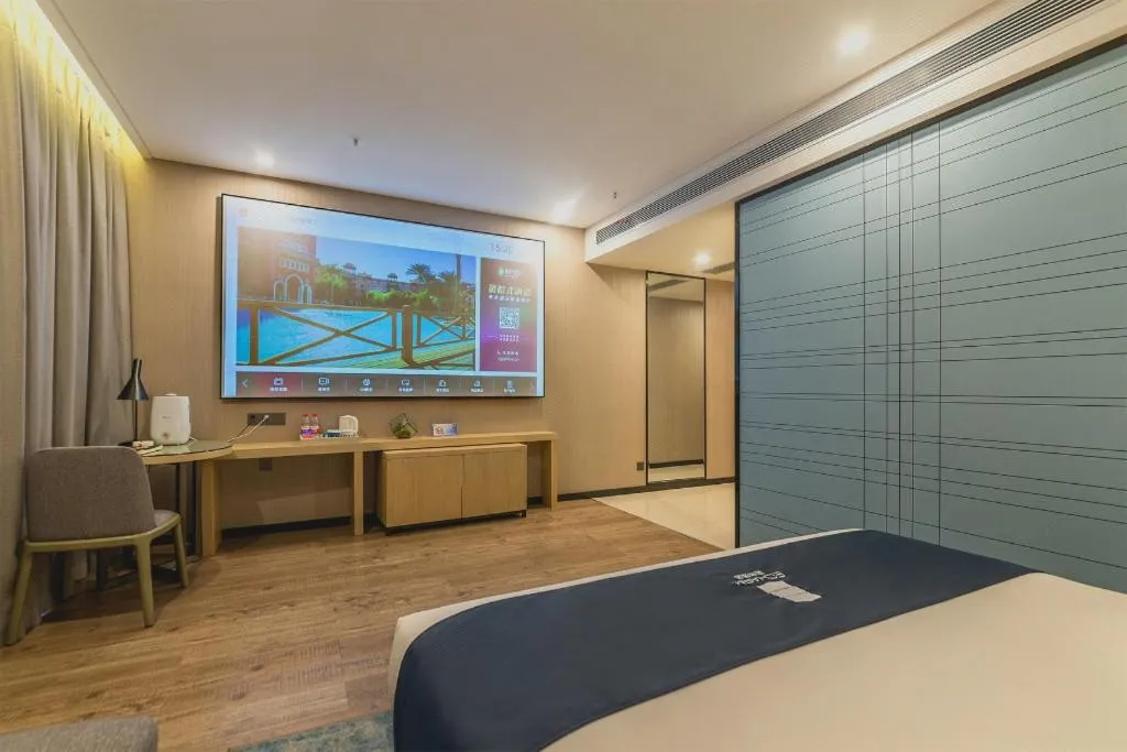 Bed in Echarm Hotel Kunming Railway Station Huancheng South Road Metro Station