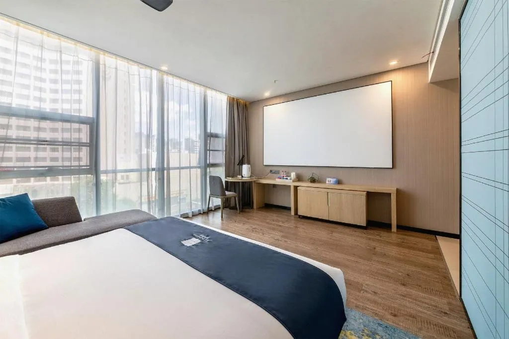 Bed in Echarm Hotel Kunming Railway Station Huancheng South Road Metro Station