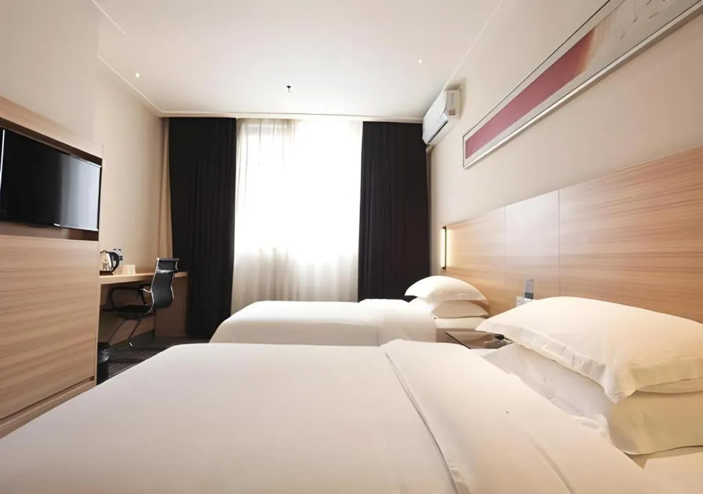 Bed in City Comfort Inn Wuhan Jiqing Street Dazhi Road Metro Station