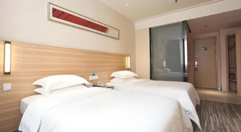 Bed in City Comfort Inn Wuhan Jiqing Street Dazhi Road Metro Station