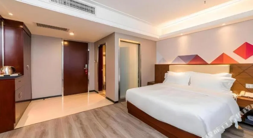 Bed in Borrman Hotel Guangzhou Railway Station Sanyuanli Metro Station