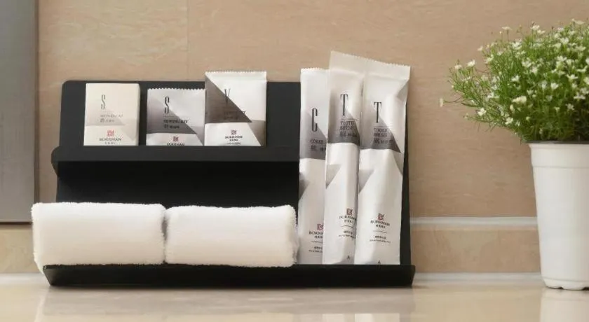 Bed in Borrman Hotel Guangzhou Railway Station Sanyuanli Metro Station