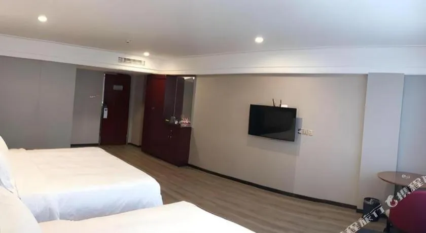 Bed in Borrman Hotel Guangzhou Railway Station Sanyuanli Metro Station