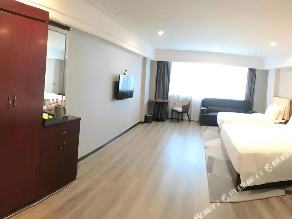 Bed in Borrman Hotel Guangzhou Railway Station Sanyuanli Metro Station