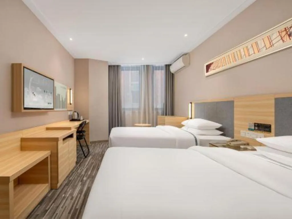 Bed in City Comfort Inn Shanghai International Automobile City Tongji University