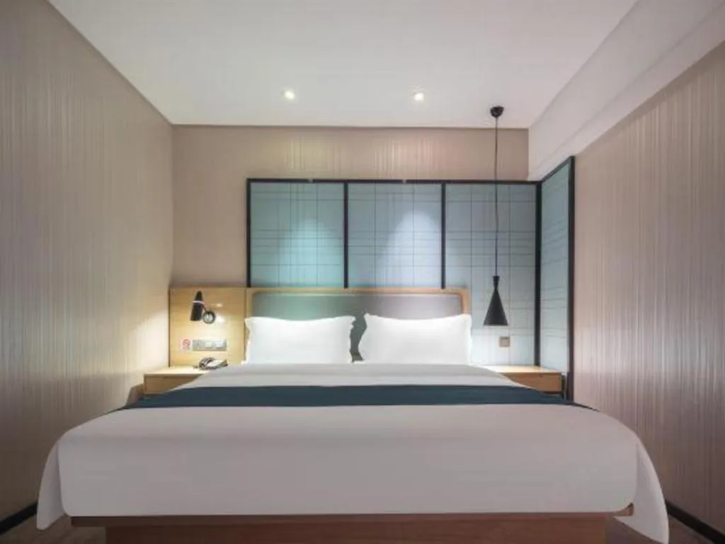 Bed in Echarm Hotel Nanning the MixC Exhibition Center Metro Station