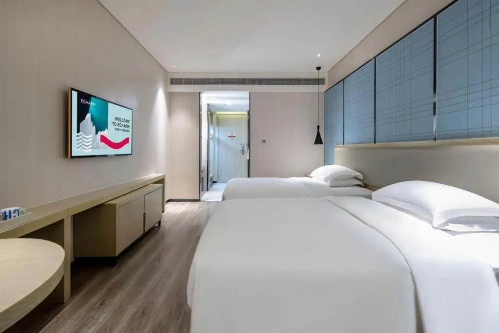 Bed in Echarm Hotel Nanning the MixC Exhibition Center Metro Station