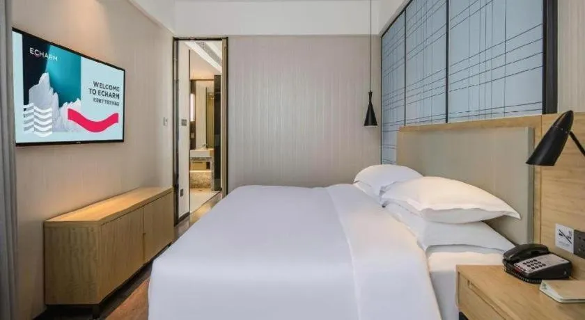 Bed in Echarm Hotel Nanning the MixC Exhibition Center Metro Station