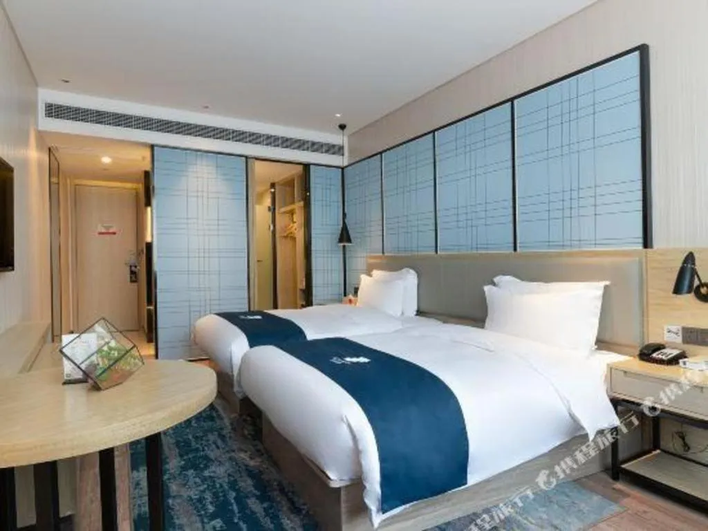 Bed in Echarm Hotel Nanning the MixC Exhibition Center Metro Station