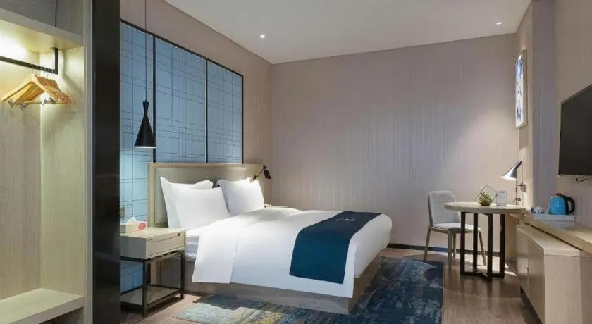 Bed in Echarm Hotel Nanning the MixC Exhibition Center Metro Station