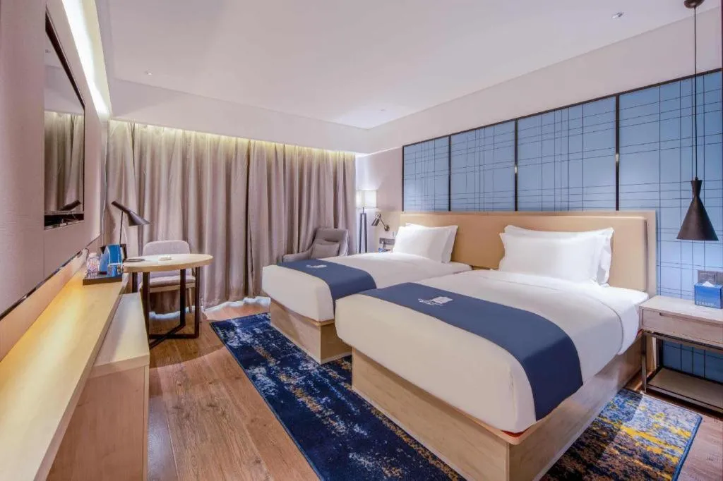 Bed in Echarm Hotel Nanning the MixC Exhibition Center Metro Station