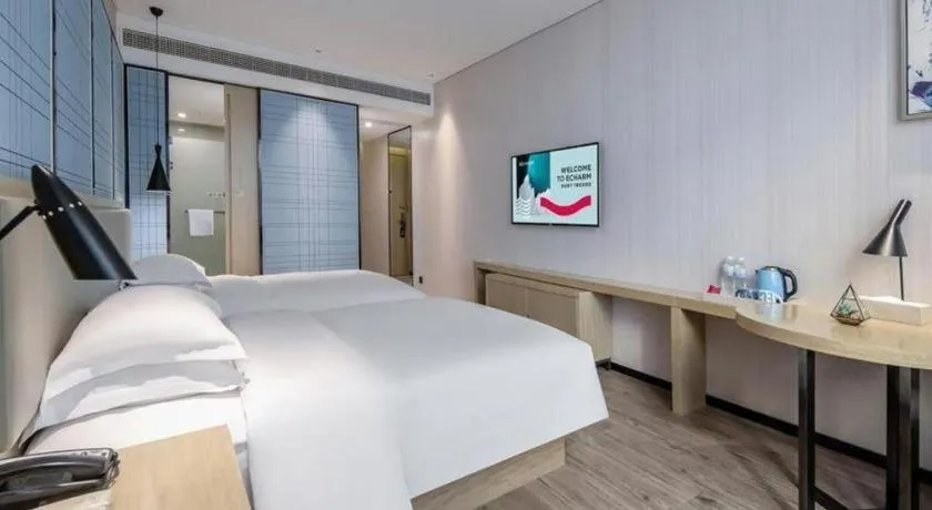 Bed in Echarm Hotel Nanning the MixC Exhibition Center Metro Station