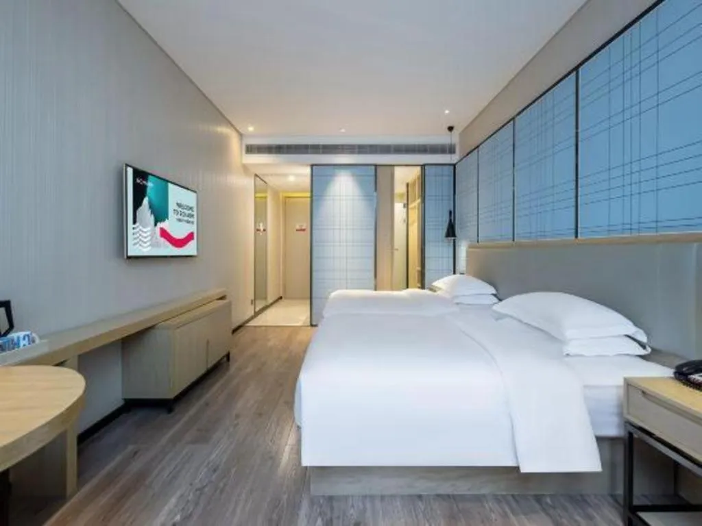 Bed in Echarm Hotel Nanning the MixC Exhibition Center Metro Station