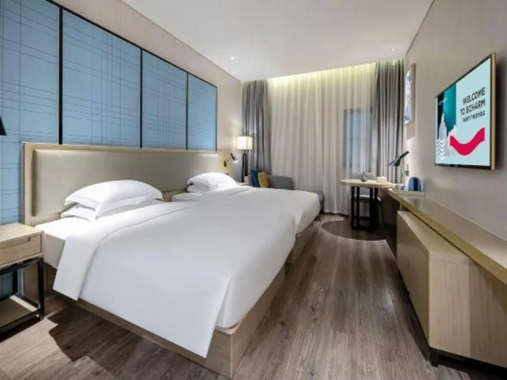 Bed in Echarm Hotel Nanning the MixC Exhibition Center Metro Station