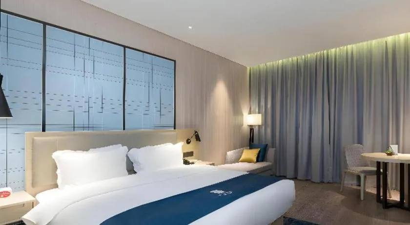 Bed in Echarm Hotel Nanning the MixC Exhibition Center Metro Station