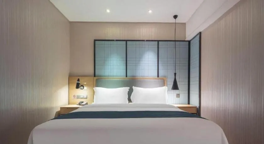 Bed in Echarm Hotel Nanning the MixC Exhibition Center Metro Station