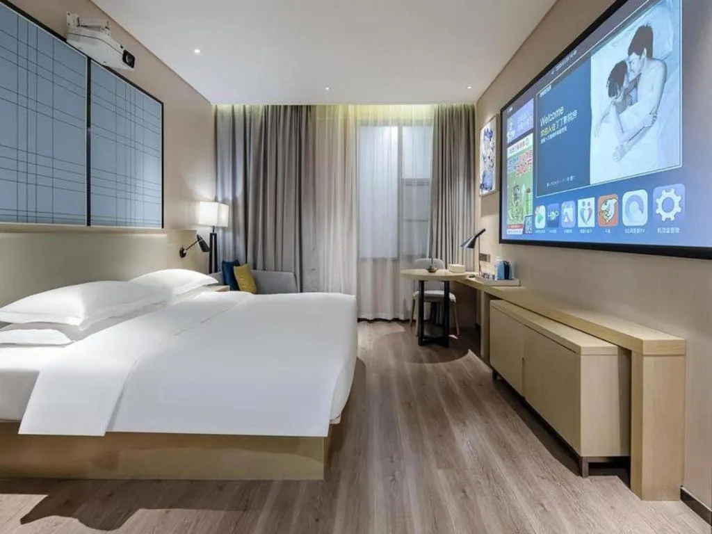 Bed in Echarm Hotel Nanning the MixC Exhibition Center Metro Station