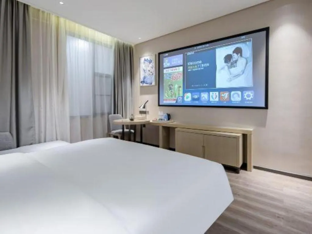 Bed in Echarm Hotel Nanning the MixC Exhibition Center Metro Station