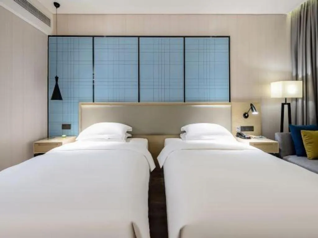 Bed in Echarm Hotel Nanning the MixC Exhibition Center Metro Station