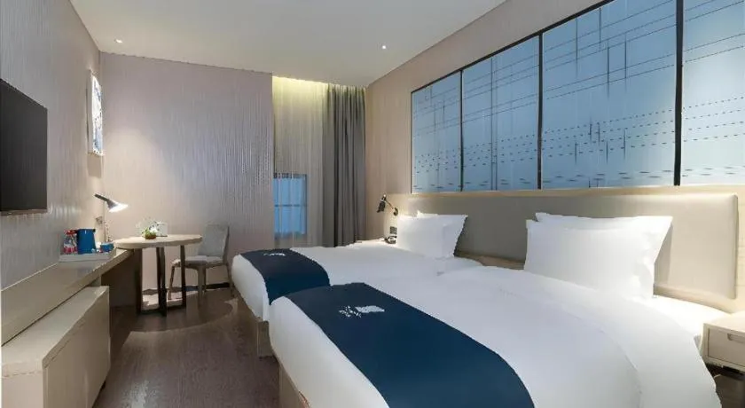 Bed in Echarm Hotel Nanning the MixC Exhibition Center Metro Station