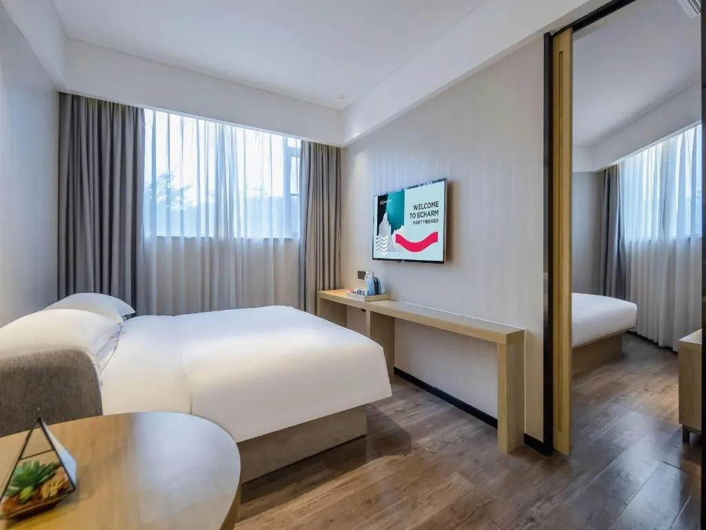Bed in Echarm Hotel Nanning the MixC Exhibition Center Metro Station