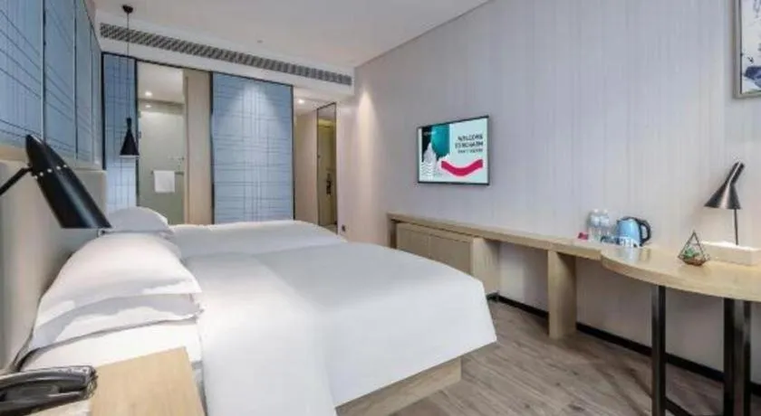 Bed in Echarm Hotel Nanning the MixC Exhibition Center Metro Station