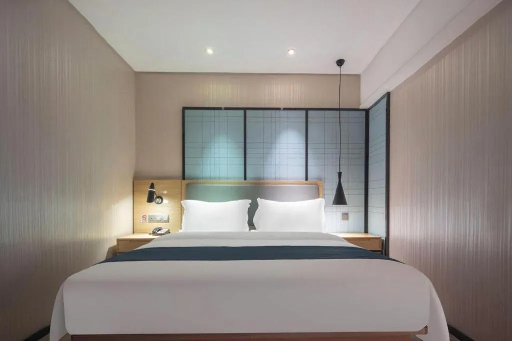 Bed in Echarm Hotel Nanning the MixC Exhibition Center Metro Station