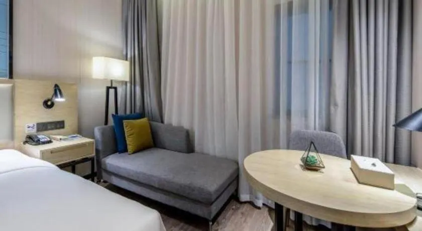 Bed in Echarm Hotel Nanning the MixC Exhibition Center Metro Station