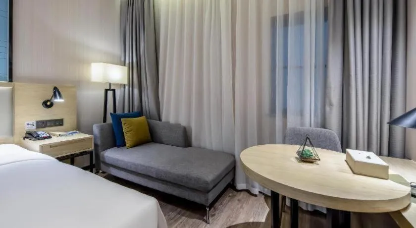 Bed in Echarm Hotel Nanning the MixC Exhibition Center Metro Station