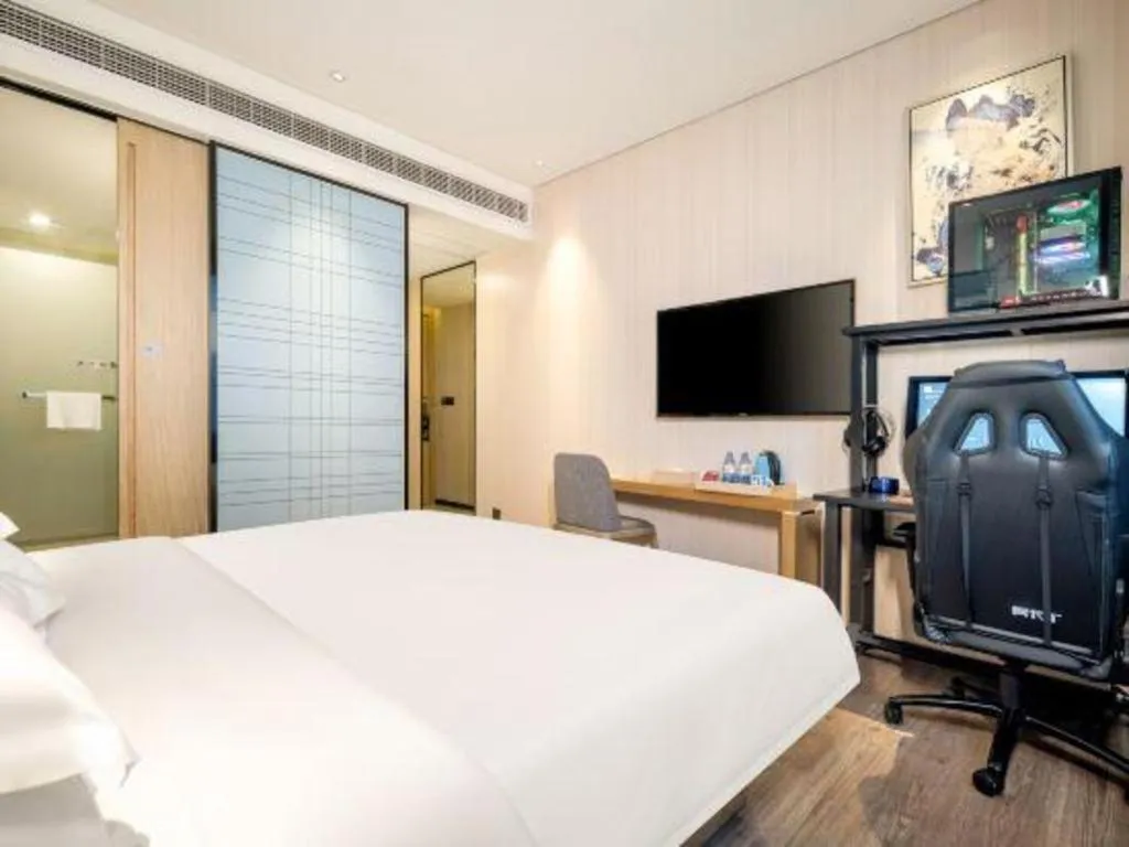 Bed in Echarm Hotel Nanning the MixC Exhibition Center Metro Station